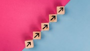 Pink and blue diagonal line of arrows